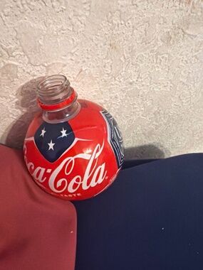 limited-edition Coca-Cola soccer ball-shaped bottle released for the 2026 FIFA W